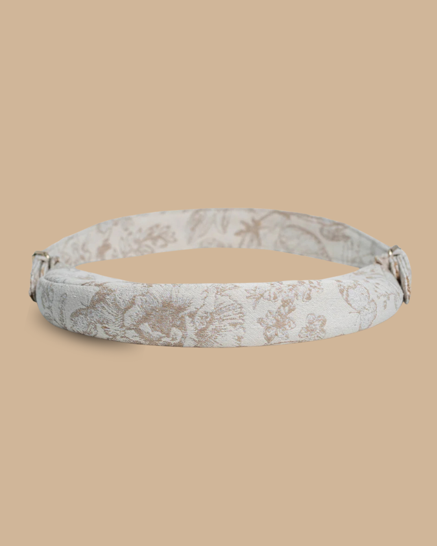 The Flora block-print shoulder bag — detail of the hand-blocked floral print on ivory fabric