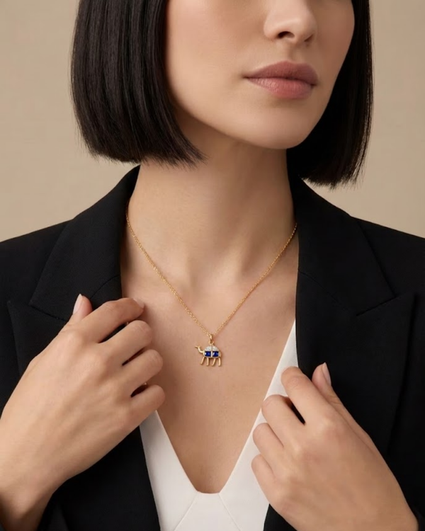 The Nomad Camel Pendant, gold-tone, front view — Gullye