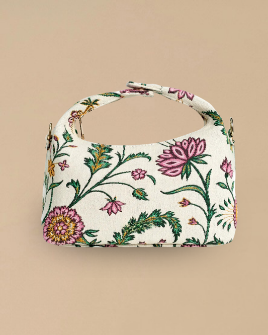 The Peony block-print top-handle bag — front view with pink and green hand-blocked floral blooms on ivory fabric