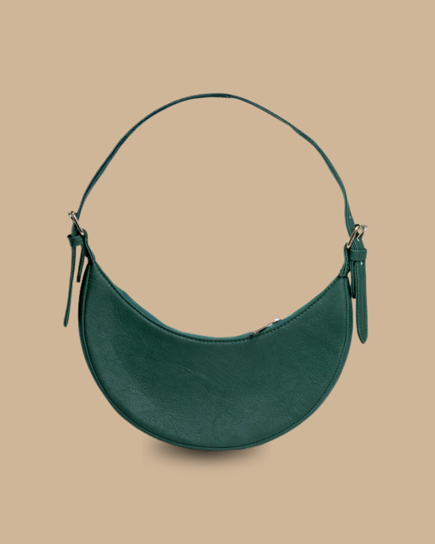 The Ivy shoulder bag — detail of the slim strap and smooth leather finish