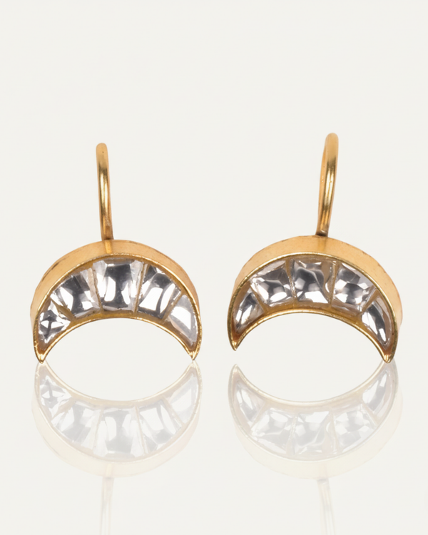 Lunar Crescent Ear Cuff carried by a model, styled for evening