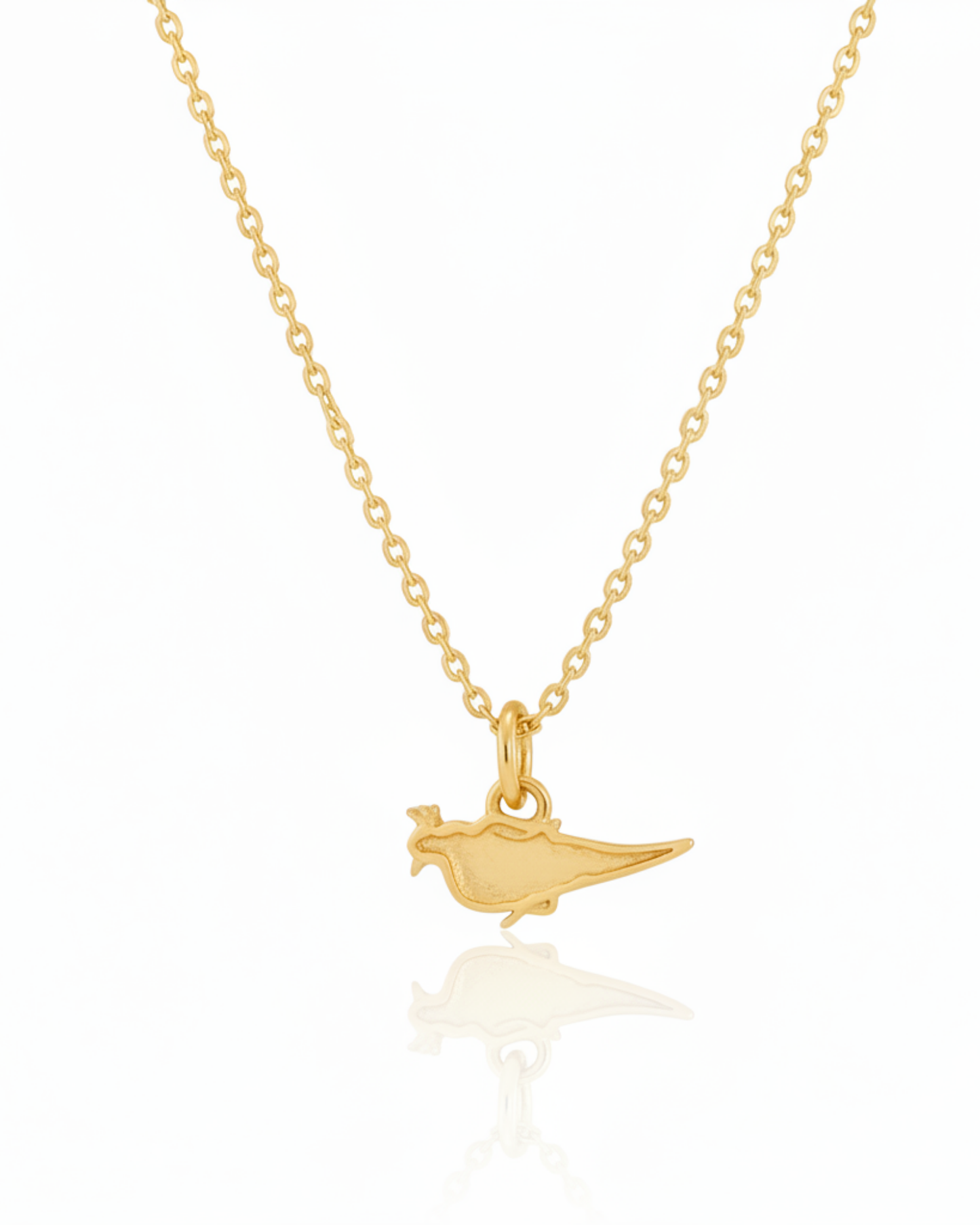 Back of The Gilded Finch Pendant showing the polished-gold bird silhouette.