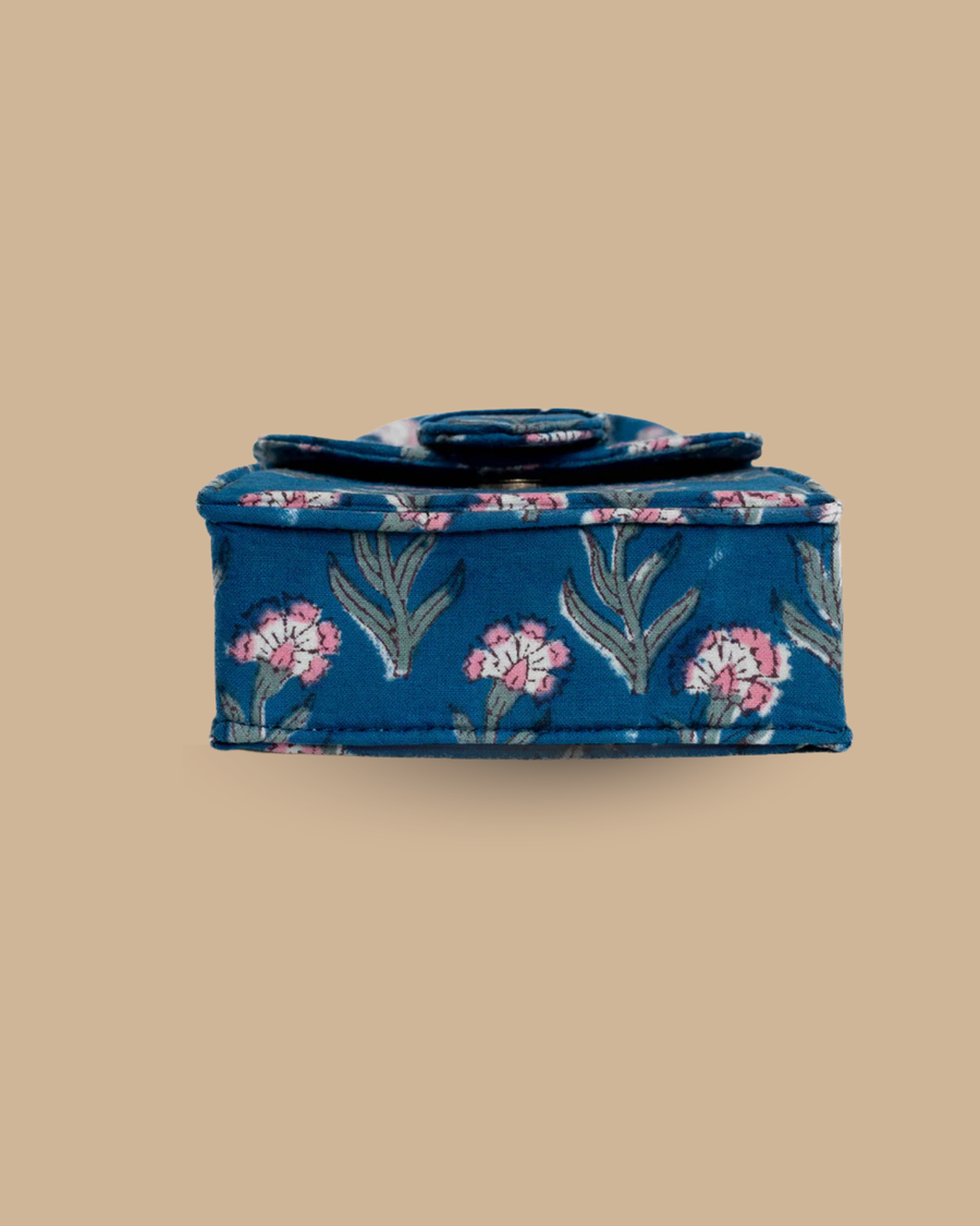 The Soir block-print mini bag — detail of the hand-blocked blue floral motif
