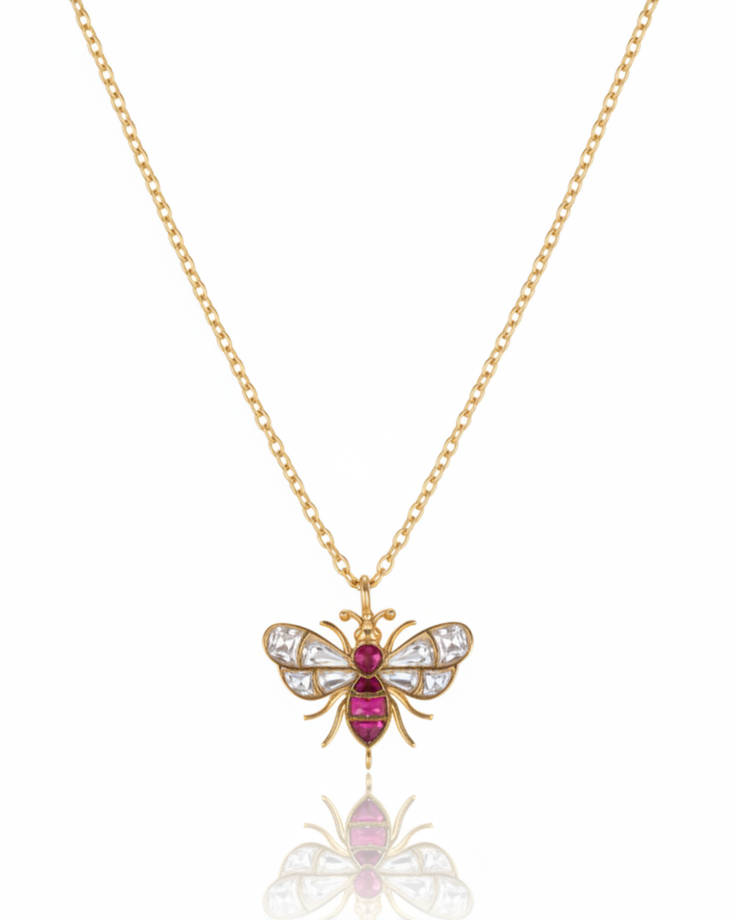 Front of The Imperial Bee Pendant: a gold bee with rose-cut crystal wings and a ruby-set body.