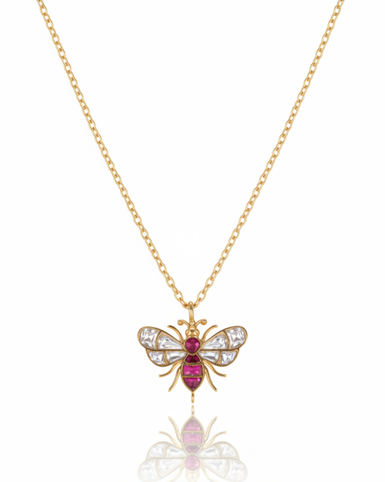 Front of The Imperial Bee Pendant: a gold bee with rose-cut crystal wings and a ruby-set body.