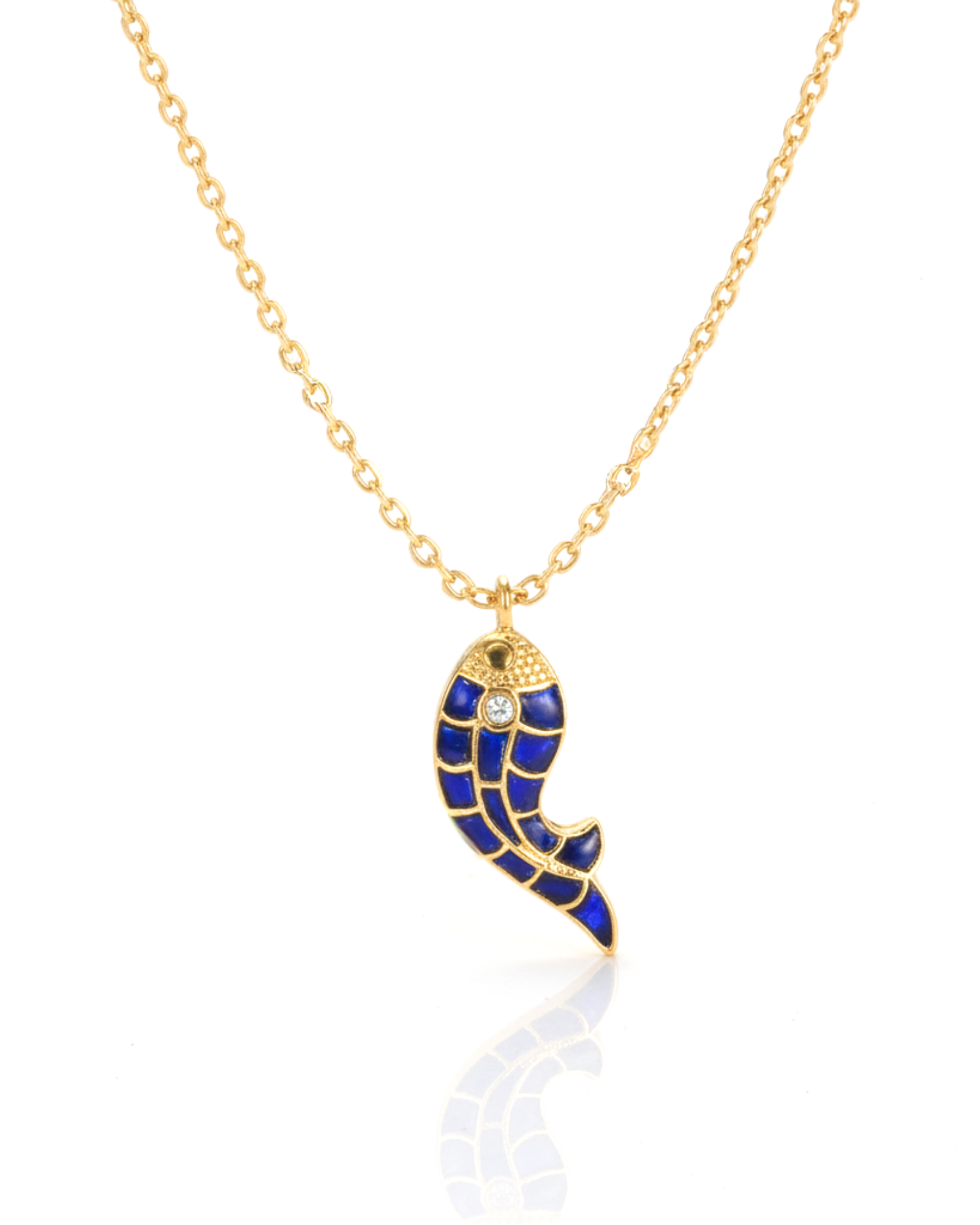 Front of The Royal Indigo Koi Pendant: a gold koi fish inlaid with indigo enamel and a crystal eye.