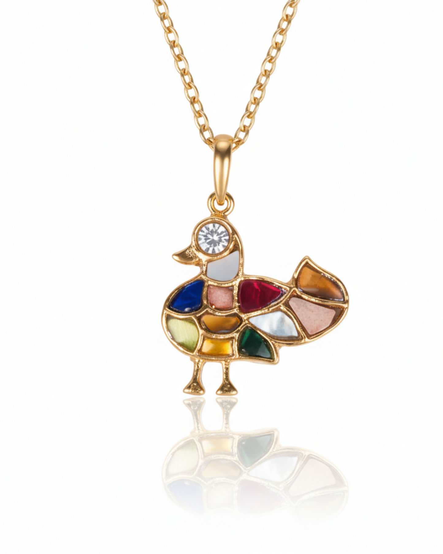 Front of The Mosaic Mandarin Pendant: a gold mandarin duck set with a mosaic of multicolored stones and a crystal eye.
