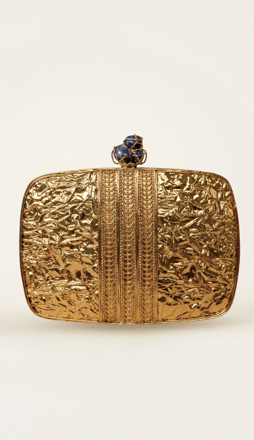 The Geode brass minaudière, side profile