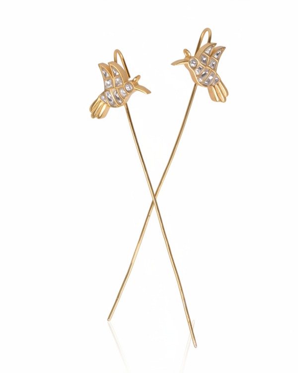Ascending Bird Ear Climber carried by a model, styled for evening