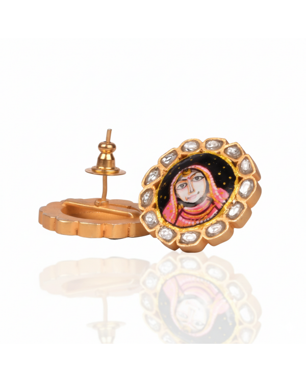 The Raja-Rani Heritage Studs worn by a model as an evening accessory