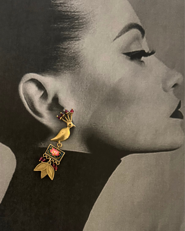 The Royal Mor (Peacock) Lotus Drops styled by a model in an editorial look